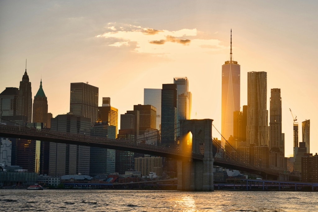 Sunset behind the skyline of New York, the top city for legal jobs